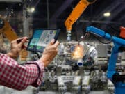 Welding of heavy objects using industrial robots